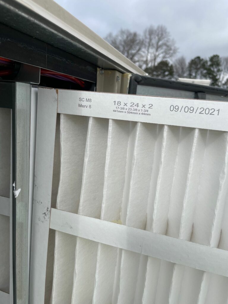 MERV-8 and MERV-14 filters in rooftop units during construction.